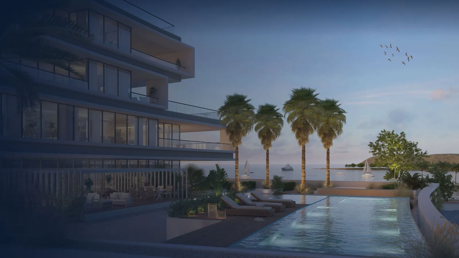 The Arc serviced residences on the marina at dusk
